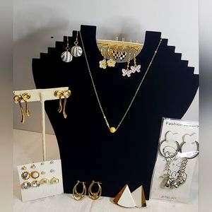 Keychain, 13 pairs of earrings, and a necklace